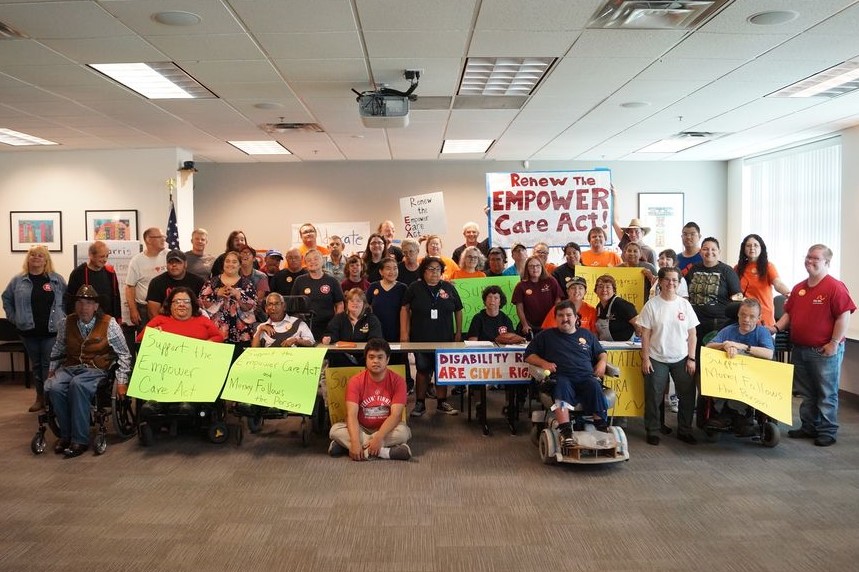 Advocacy - group posing with signs