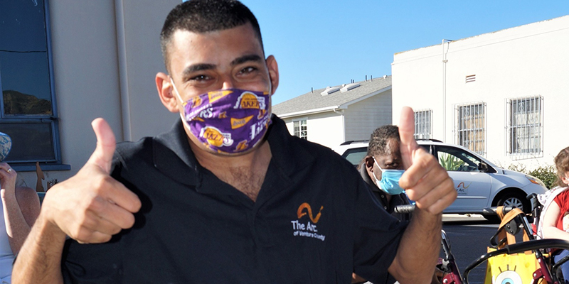 Website-cropped Volunteer thumbs up